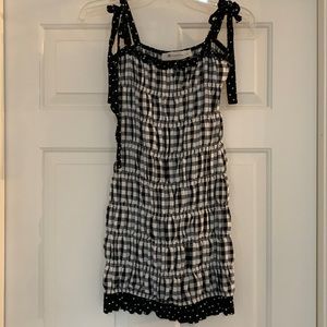 The Impeccable pig. black and white checkered dress.